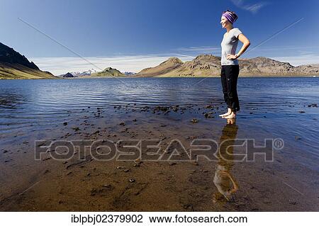 "Young woman reflected in Lake Alftavatn, Laugavegur, Iceland, Europe" View Large Photo Image Stock Image - "Young woman reflected in Lake Alftavatn, Laugavegur, Iceland, Europe". Fotosearch