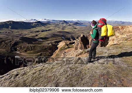 "Young woman trekking, Laugavegur, Iceland, Europe" View Large Photo Image Stock Photograph - "Young woman trekking, Laugavegur, Iceland, Europe". Fotosearch