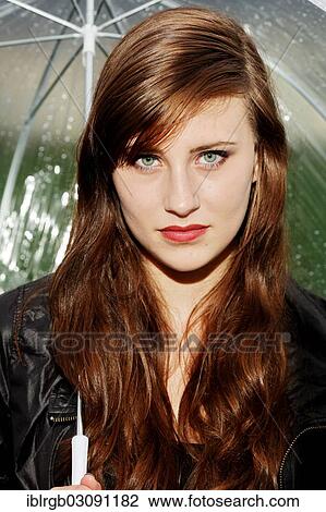 "Young woman under a transparent umbrella, Ri, Baden-Wurttemberg, Germany, Europe" View Large Photo Image Stock Image - "Young woman under a transparent umbrella, Ri, Baden-Wurttemberg, Germany, Europe". Fotosearch
