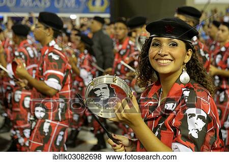 Stock Photo - "Young woman wearing a Che Guevara costume, a member of the drum group Bateria, parade of the samba school Academicos do Salgueiro, Sambodromo, Rio de Janeiro, Brazil, South America". Fotosearch