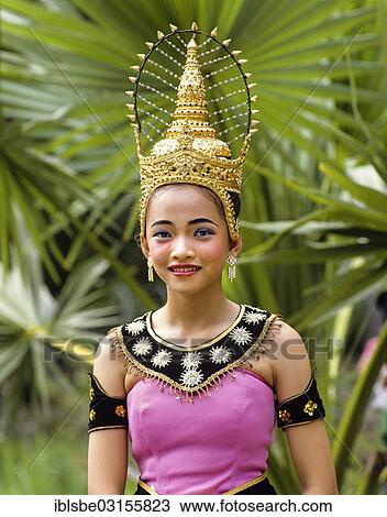 Stock Image - "Young woman wearing a traditional costume, Sukhothai style, Sukhothai, Sukhothai Province, Northern Thailand, Thailand, Asia". Fotosearch