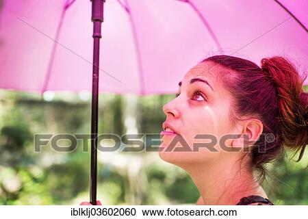 "Young woman with a pink umbrella in the sun, Chiang Mai, Chiang Mai Province, Thailand, Asia" View Large Photo Image Stock Image - "Young woman with a pink umbrella in the sun, Chiang Mai, Chiang Mai Province, Thailand, Asia". Fotosearch