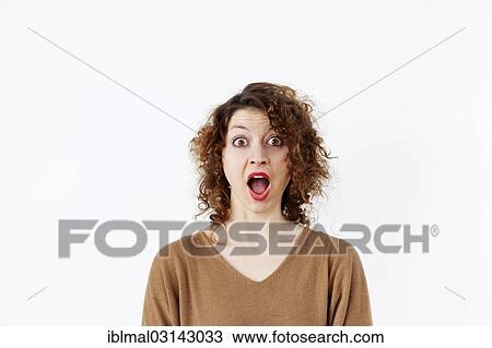 Young woman with a surprised expression View Large Photo Image Stock Image - Young woman with a surprised expression. Fotosearch