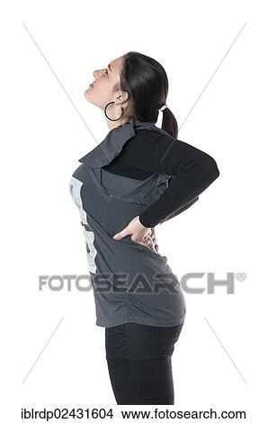 Picture - Young woman with back pain. Fotosearch