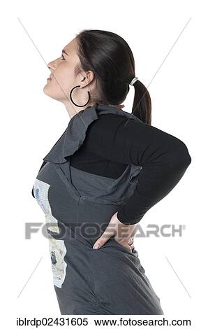 Stock Photography - Young woman with back pain. Fotosearch