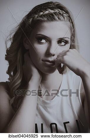 Stock Photography - Young woman with braided hair. Fotosearch