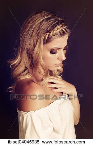 Stock Photography - Young woman with braided hair. Fotosearch