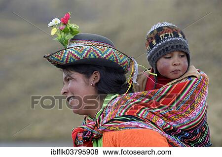 "Young woman with child in a sling, Union Potrero, Quispillacta, Ayacucho, Peru, South America" View Large Photo Image Stock Photo - "Young woman with child in a sling, Union Potrero, Quispillacta, Ayacucho, Peru, South America". Fotosearch