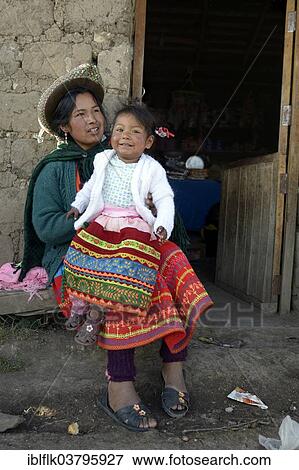 Stock Photo - "Young woman with girl in traditional costume, Union Potrero, Quispillacta, Ayacucho, Peru, South America". Fotosearch