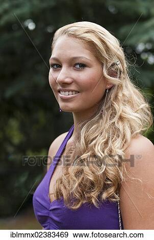 Stock Photo - "Young woman with long blond hair, Germany, Europe". Fotosearch