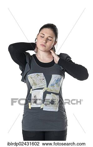 Stock Image - Young woman with neck pain. Fotosearch