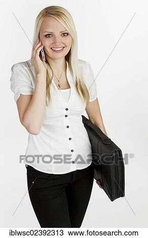 Young woman with smartphone and briefcase View Large Photo Image Stock Image - Young woman with smartphone and briefcase. Fotosearch