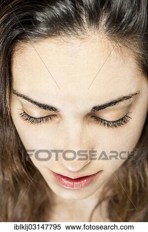 Stock Photography - Young woman's face. Fotosearch
