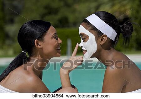 Young women are enjoying a wellness and spa day View Large Photo Image Picture - Young women are enjoying a wellness and spa day. Fotosearch