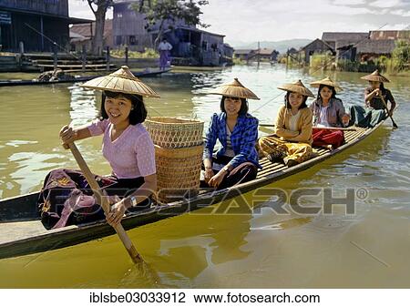 "Young women in a boat on Inle Lake, Inle See, Shan State, Myanmar, Burma, Asia" View Large Photo Image Stock Image - "Young women in a boat on Inle Lake, Inle See, Shan State, Myanmar, Burma, Asia". Fotosearch