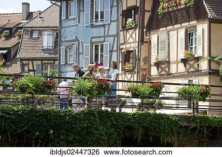 "Young women on a bridge in Petite Venise, Little Venice, Colmar, Alsace, France, Europe" View Large Photo Image Stock Photograph - "Young women on a bridge in Petite Venise, Little Venice, Colmar, Alsace, France, Europe". Fotosearch