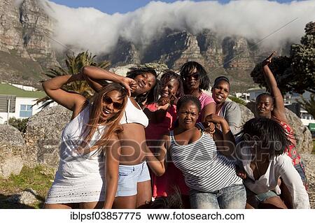 "Young women posing in front of the Twelve Apostles, Camps Bay, Cape Town, Western Cape, South Africa, Africa" View Large Photo Image Stock Photography - "Young women posing in front of the Twelve Apostles, Camps Bay, Cape Town, Western Cape, South Africa, Africa". Fotosearch