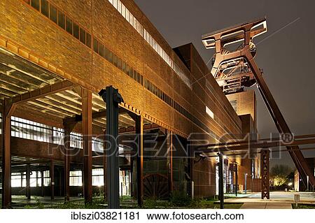 "Zeche Zollverein Coal Mine Shaft XII with headframe, illuminated at night, Essen, Ruhr area, North Rhine-Westphalia, Germany, Europe" View Large Photo Image Stock Image - "Zeche Zollverein Coal Mine Shaft XII with headframe, illuminated at night, Essen, Ruhr area, North Rhine-Westphalia, Germany, Europe". Fotosearch