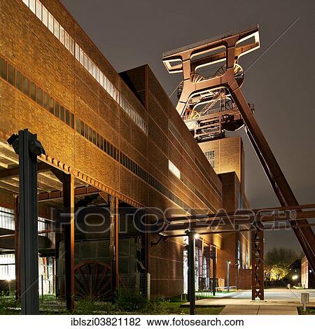 "Zeche Zollverein Coal Mine Shaft XII with headframe, illuminated at night, Essen, Ruhr area, North Rhine-Westphalia, Germany, Europe" View Large Photo Image Stock Image - "Zeche Zollverein Coal Mine Shaft XII with headframe, illuminated at night, Essen, Ruhr area, North Rhine-Westphalia, Germany, Europe". Fotosearch