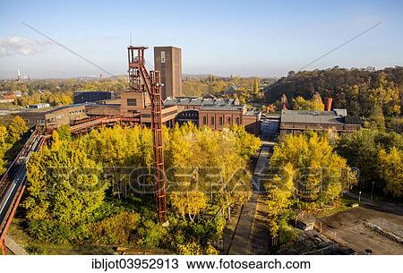 "Zeche Zollverein, former colliery, UNESCO World Heritage Site, headframe, pit no. 12, at the back the pits 1-2-8, Essen, North Rhine-Westphalia, Germany, Europe" View Large Photo Image Stock Image - "Zeche Zollverein, former colliery, UNESCO World Heritage Site, headframe, pit no. 12, at the back the pits 1-2-8, Essen, North Rhine-Westphalia, Germany, Europe". Fotosearch
