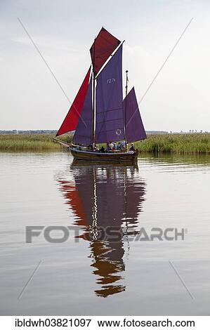 "Zeesenboot boat on the Bodden, Baltic Sea peninsula of Fischland-Darss-Zingst, Zingst, Mecklenburg-Vorpommern, Germany, Europe" View Large Photo Image Stock Photo - "Zeesenboot boat on the Bodden, Baltic Sea peninsula of Fischland-Darss-Zingst, Zingst, Mecklenburg-Vorpommern, Germany, Europe". Fotosearch