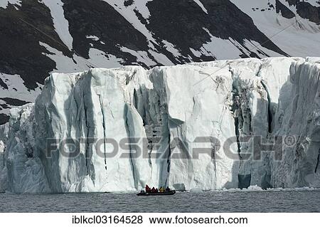 "Zodiac inflatable boat during an expedition cruise in front of Samarinbreen Glacier, Samarinvagen, Hornsund, Spitsbergen Island, Svalbard Archipelago, Svalbard and Jan Mayen, Norway, Europe" View Large Photo Image Stock Photo - "Zodiac inflatable boat during an expedition cruise in front of Samarinbreen Glacier, Samarinvagen, Hornsund, Spitsbergen Island, Svalbard Archipelago, Svalbard and Jan Mayen, Norway, Europe". Fotosearch