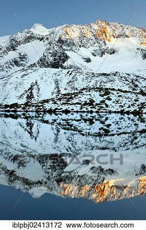 Zuckerhuetl Mountain reflected in the water, Stubai Glacier, Tyrol, Austria, Europe View Large Photo Image Stock Image - Zuckerhuetl Mountain reflected in the water, Stubai Glacier, Tyrol, Austria, Europe. Fotosearch