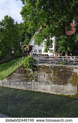 "Zur Muehle an der Flossrutsche Restaurant with a beer garden, Isar river, Upper Bavaria, Bavaria, Germany, Europe" View Large Photo Image Stock Photo - "Zur Muehle an der Flossrutsche Restaurant with a beer garden, Isar river, Upper Bavaria, Bavaria, Germany, Europe". Fotosearch