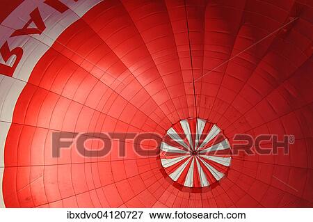 A red hot air balloon being inflated, Canton of Bern, Switzerland, Europe View Large Photo Image Stock Photo - A red hot air balloon being inflated, Canton of Bern, Switzerland, Europe. Fotosearch