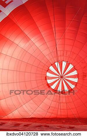A red hot air balloon being inflated, Canton of Bern, Switzerland, Europe View Large Photo Image Stock Photo - A red hot air balloon being inflated, Canton of Bern, Switzerland, Europe. Fotosearch