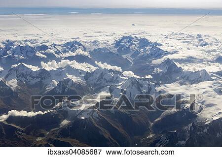 Stock Photo - Aerial view of the Valais Alps with Mt Matterhorn and the summit Dufourspitze of Monte Rosa, Valais Alps, Switzerland, Europe. Fotosearch