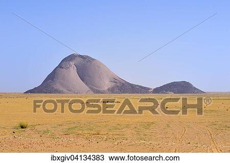 Stock Image - Aicha monolith in the flat desert, Adrar region, Mauritania, Africa. Fotosearch