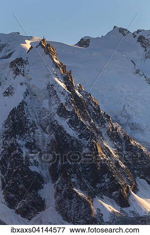 Aiguille du Midi upper station, evening light, Chamonix, Rhone-Alpes, France, Europe View Large Photo Image Stock Photo - Aiguille du Midi upper station, evening light, Chamonix, Rhone-Alpes, France, Europe. Fotosearch