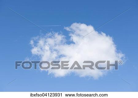Aircraft flying past a cloud View Large Photo Image Stock Image - Aircraft flying past a cloud. Fotosearch