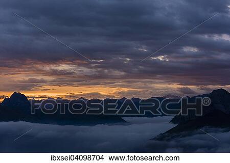 Allgau mountains with sea of fog at sunrise, Au, Bregenz Forest, Vorarlberg, Austria, Europe View Large Photo Image Picture - Allgau mountains with sea of fog at sunrise, Au, Bregenz Forest, Vorarlberg, Austria, Europe. Fotosearch