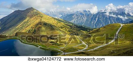 Artificial lake to feed water to the snow cannons for the slopes of the Fellhornbahn and Kanzelwandbahn, Fellhorn behind, 2038m, Allgau Alps, Bavaria, Germany, Europe View Large Photo Image Stock Image - Artificial lake to feed water to the snow cannons for the slopes of the Fellhornbahn and Kanzelwandbahn, Fellhorn behind, 2038m, Allgau Alps, Bavaria, Germany, Europe. Fotosearch