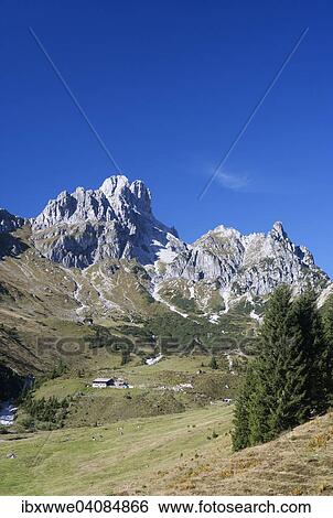 Stock Photograph - Aualm alp with Mt Bischofsmutze, Gosaukamm ridge, Dachstein Massif, Filzmoos, Salzburg State, Austria, Europe. Fotosearch