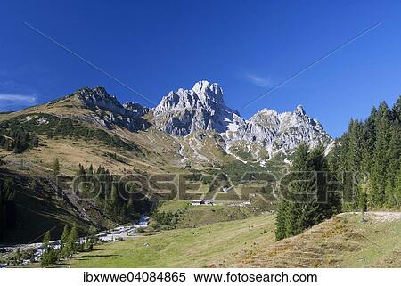 Stock Photography - Aualm alp with Mt Bischofsmutze, Gosaukamm ridge, Dachstein Massif, Filzmoos, Salzburg State, Austria, Europe. Fotosearch