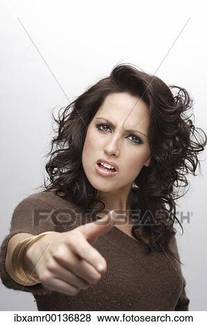 Bad-tempered young woman, gesticulating View Large Photo Image Stock Photo - Bad-tempered young woman, gesticulating. Fotosearch