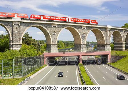Bahrebachmuhle viaduct, train crossing the three-lane A4 motorway between Chemnitz-Glosa and Chemnitz-Mitte, Chemnitz, Saxony, Germany, Europe View Large Photo Image Stock Photo - Bahrebachmuhle viaduct, train crossing the three-lane A4 motorway between Chemnitz-Glosa and Chemnitz-Mitte, Chemnitz, Saxony, Germany, Europe. Fotosearch