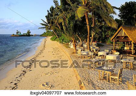Bar on the beach at sunset, La Digue Island, La Digue and Inner Islands, Seychelles, Africa View Large Photo Image Stock Photo - Bar on the beach at sunset, La Digue Island, La Digue and Inner Islands, Seychelles, Africa. Fotosearch