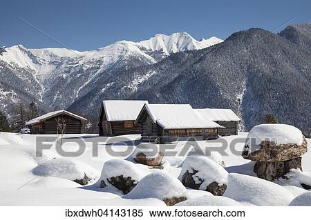 Barns in the snow in front of the Karwendel Mountains, near Mittenwald, Werdenfelser Land, Upper Bavaria, Bavaria, Germany, Europe View Large Photo Image Stock Photography - Barns in the snow in front of the Karwendel Mountains, near Mittenwald, Werdenfelser Land, Upper Bavaria, Bavaria, Germany, Europe. Fotosearch