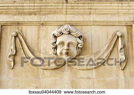 Baroque-style face on a fountain at St. John's Co-Cathedral, church of the Order of the Knights Hospitaller of St John, historic centre, Valletta, Malta, Europe View Large Photo Image Stock Photo - Baroque-style face on a fountain at St. John's Co-Cathedral, church of the Order of the Knights Hospitaller of St John, historic centre, Valletta, Malta, Europe. Fotosearch