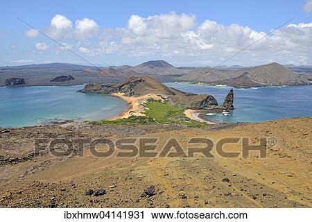 Bartolome Island, western peninsula with Pinnacle Rock, Santiago Island, also San Salvador Island, behind, Galapagos Province, Galapagos Islands, Ecuador, South America View Large Photo Image Stock Image - Bartolome Island, western peninsula with Pinnacle Rock, Santiago Island, also San Salvador Island, behind, Galapagos Province, Galapagos Islands, Ecuador, South America. Fotosearch