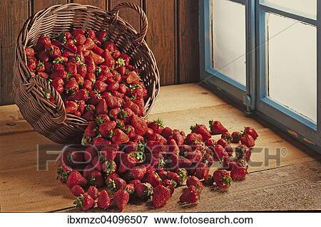 Basket with fresh strawberries at a window, against a wooden wall View Large Photo Image Stock Photo - Basket with fresh strawberries at a window, against a wooden wall. Fotosearch