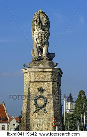 Bavarian Lion at the port entrance, Notre-Dame Cathedral behind, port, Lake Constance, Lindau, Swabia, Bavaria, Germany, Europe View Large Photo Image Stock Image - Bavarian Lion at the port entrance, Notre-Dame Cathedral behind, port, Lake Constance, Lindau, Swabia, Bavaria, Germany, Europe. Fotosearch