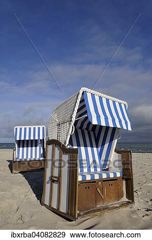 Beach chairs on the beach on the Baltic Sea, Prerow, Mecklenburg-Western Pomerania, Germany, Europe View Large Photo Image Stock Photo - Beach chairs on the beach on the Baltic Sea, Prerow, Mecklenburg-Western Pomerania, Germany, Europe. Fotosearch
