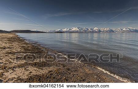 Beach, mountains, Holmbugt, Kong Oscar Fjord, Northeast Greenland National Park, Greenland, North America View Large Photo Image Picture - Beach, mountains, Holmbugt, Kong Oscar Fjord, Northeast Greenland National Park, Greenland, North America. Fotosearch