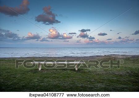 Bench, sea, clouds, evening, near Mont-Saint-Michel, Lower Normandy, France, Europe View Large Photo Image Stock Photo - Bench, sea, clouds, evening, near Mont-Saint-Michel, Lower Normandy, France, Europe. Fotosearch