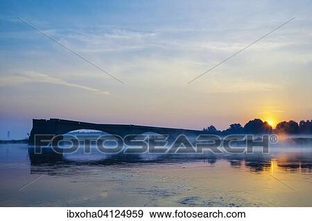 Stock Photo - Blown up Oderbrucke bridge from the Second World War, near Eisenhuttenstadt, Brandenburg, Germany, Europe. Fotosearch
